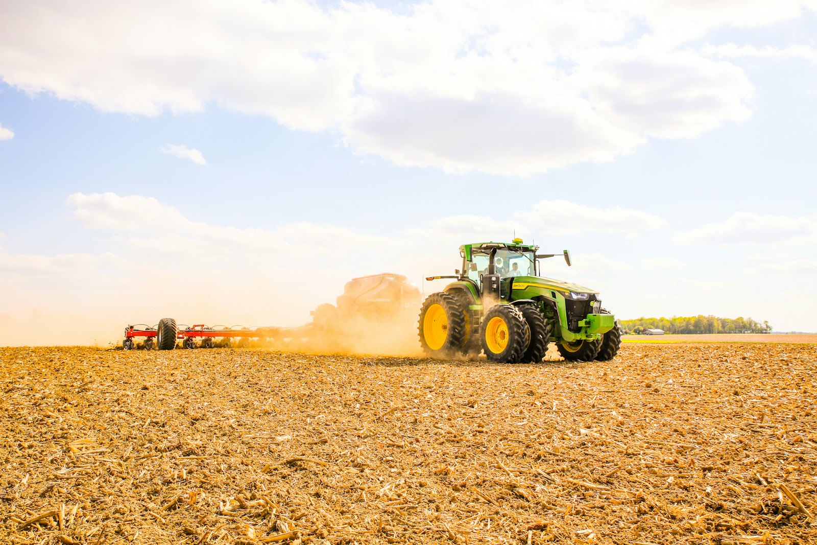Tractor preparing a dry field